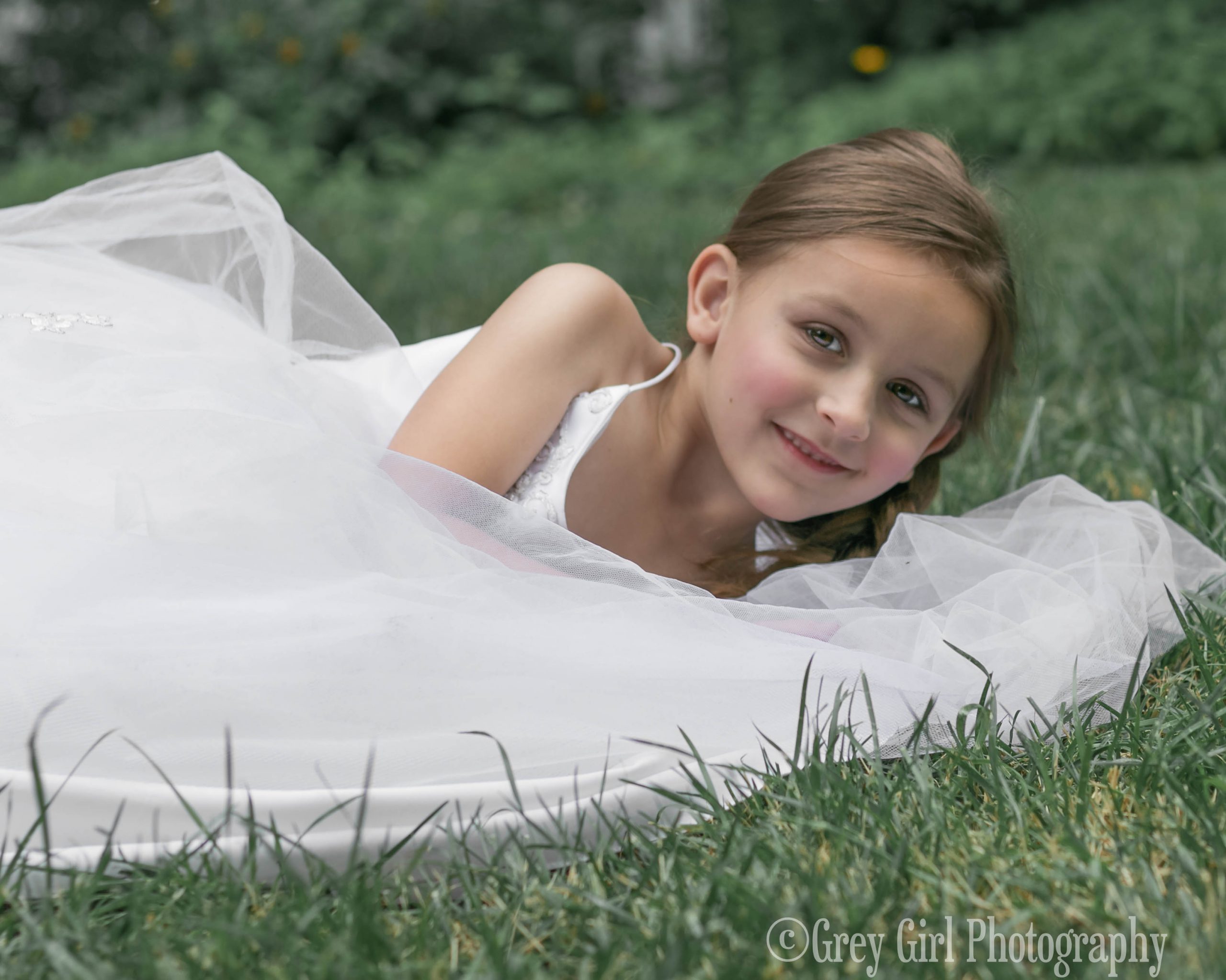 Fine Art Portrait of a girl in grass and gown in Reading, PA